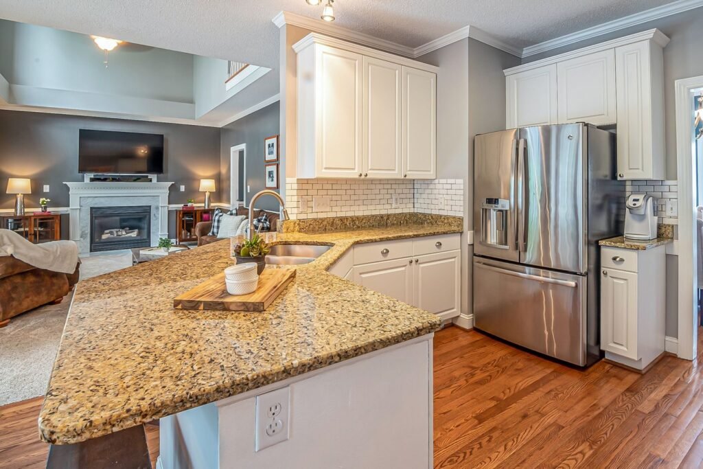 Kitchen with a granite island and breakfast bar
